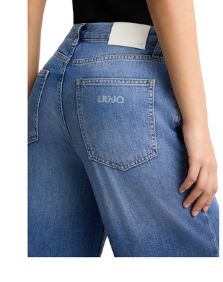 JEANS DONNA WIDE LEG CON ORLO SFRANGIATO